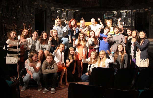 image of a group of FastForward reporters on set with the cast of ONCE