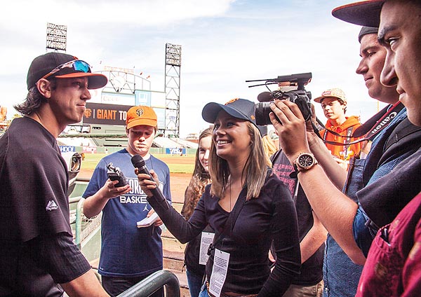 Image of the FastForward reporters with San Francisco Giant Tim Lincecum