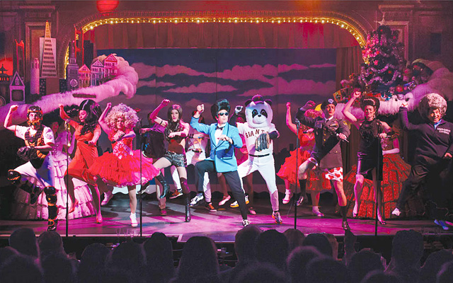 Image of one of Beach Blanket Babylon's cast ensembles on stage