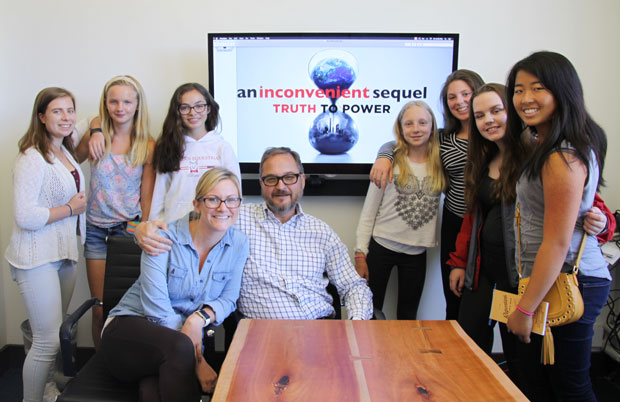 Photo of FastForward reporters Lilian Richards, Abby Smith, Simone Harper, Sophia Zoog, Wesley Slavin, Becky Booth and Jessi Sohn sit with Director Richard Berge and his co-producer