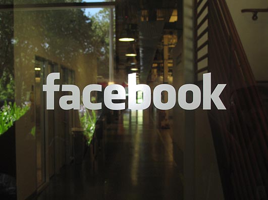 image of the FastForward Adventure Reporters posed inside Facebook Headquarters