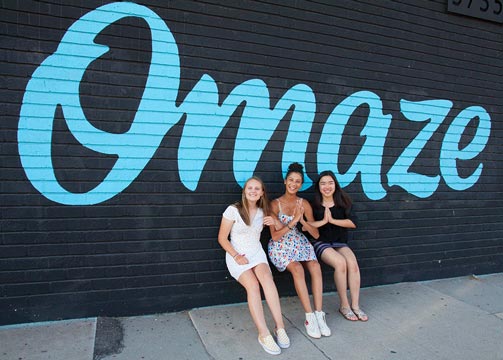 Image of FastForward reporters Kylie Sebastian, Zadie Winthrop and Jackie Chin at Omaze