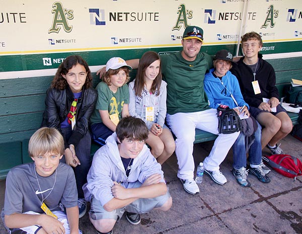 Image of the A's pitcher Joey Devine with the Adventure Reporters