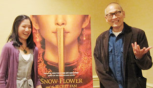 Photo of reporter Sabrina Hao with director Wayne Wang
