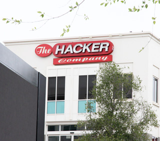 Image of sign on a Facebook building with letters The Hacking Company